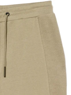 Cropp Spodnie*Beżowe dresowe joggery beżowy