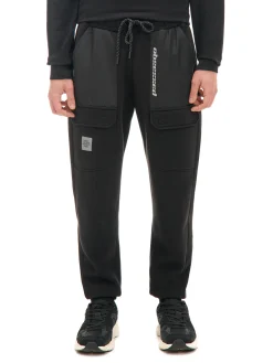 Cropp Spodnie*Czarne dresowe joggery z efektem reflective czarny