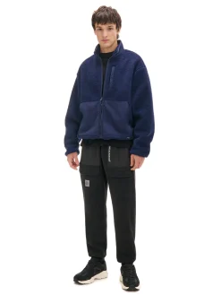 Cropp Spodnie*Czarne dresowe joggery z efektem reflective czarny