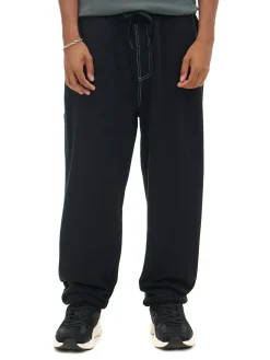 Cropp Spodnie*Czarne joggery z białym przeszyciem czarny