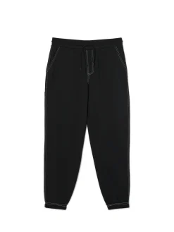 Cropp Spodnie*Czarne joggery z białym przeszyciem czarny