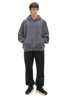 Cropp Spodnie*Dresowe joggery z odblaskowym printem czarny