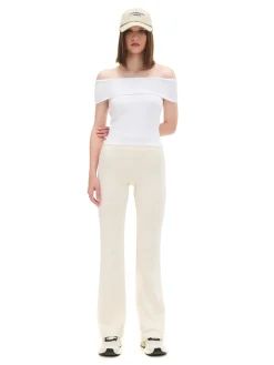 Cropp Spodnie*Kremowe dresy typu flare kremowy