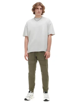 Cropp Spodnie*Zielone joggery z kieszeniami cargo zielony